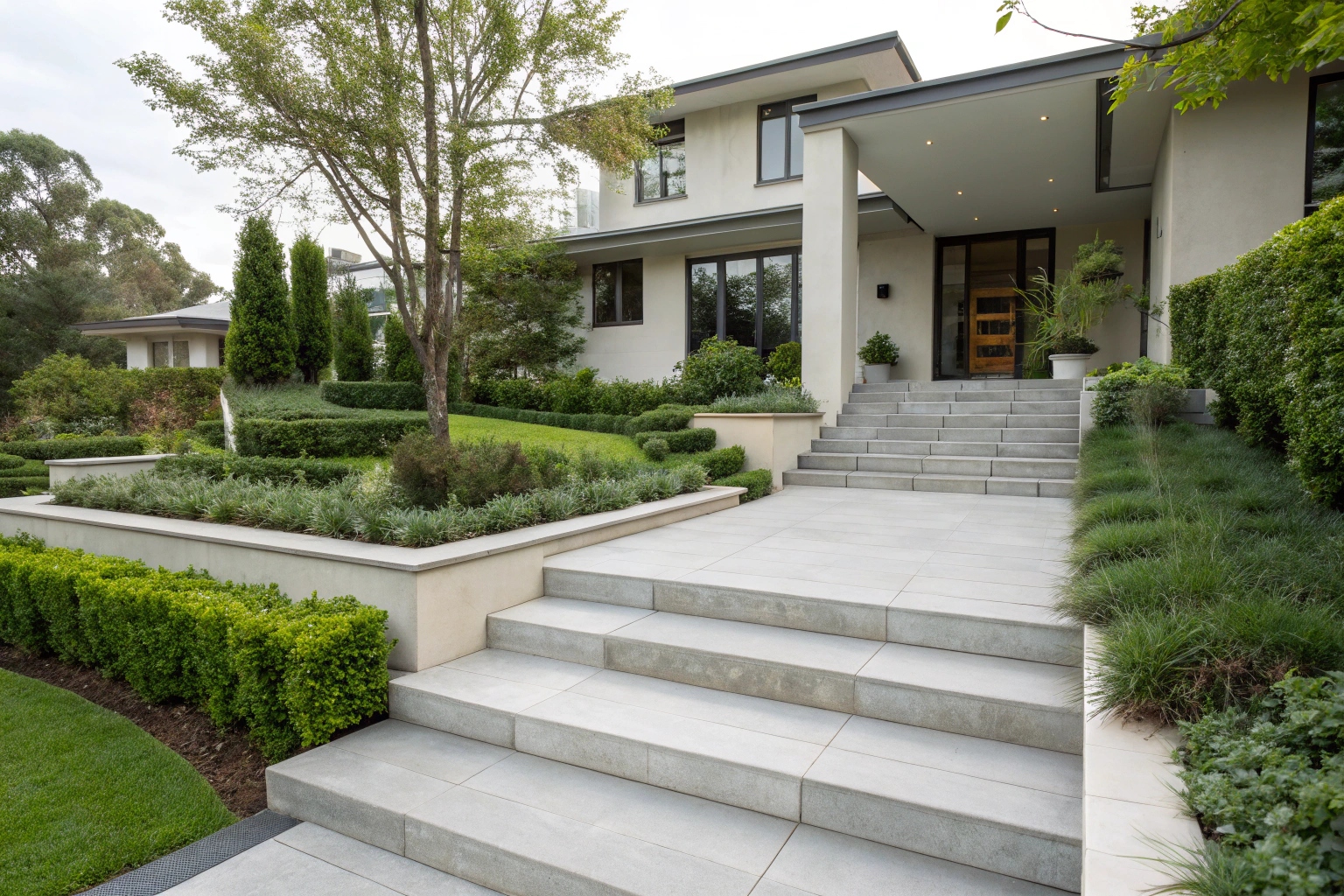 Professional concrete steps installation at a modern Canberra home entrance