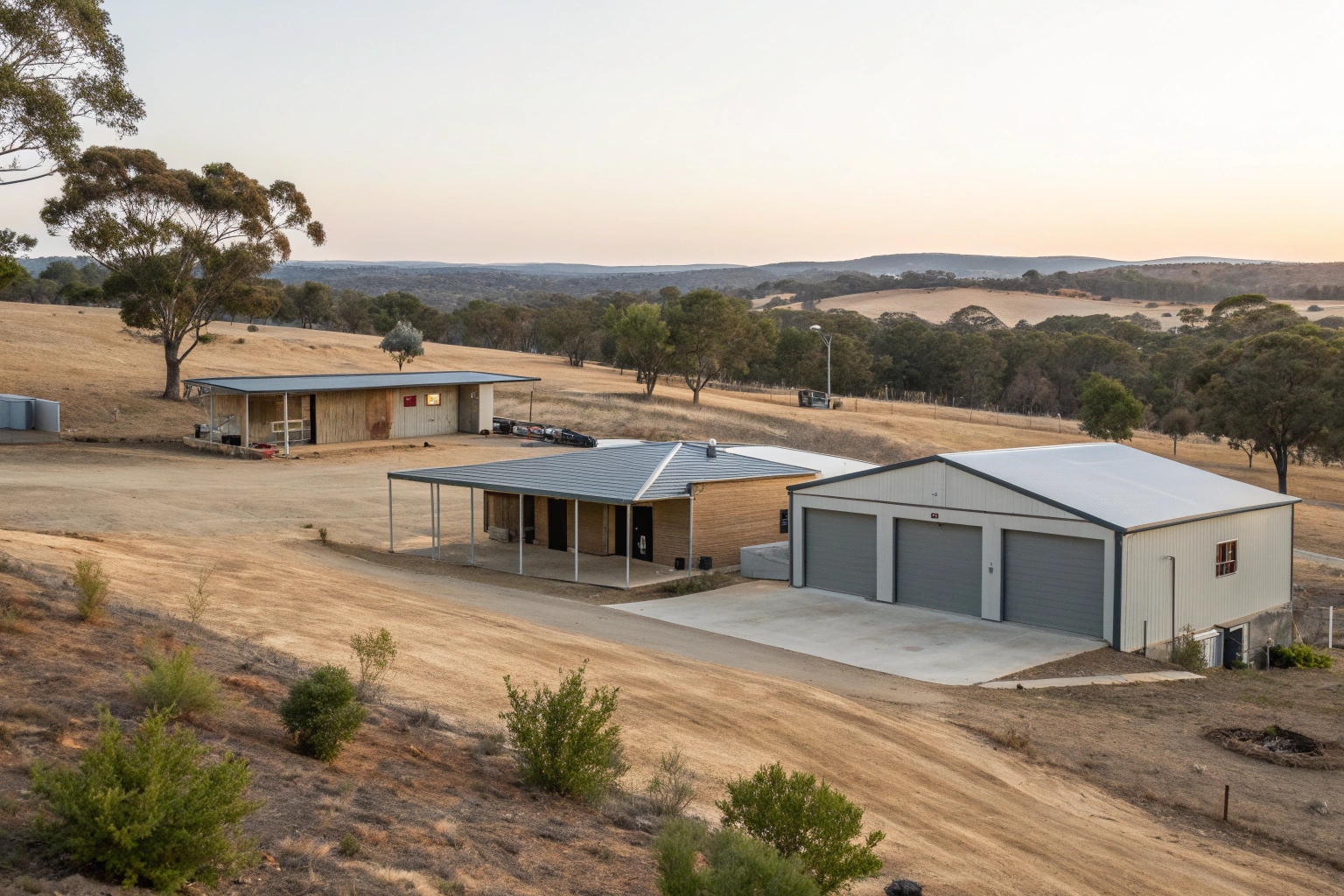 Multiple sheds and outbuildings on concrete slab foundations in a typical Canberra residential setting